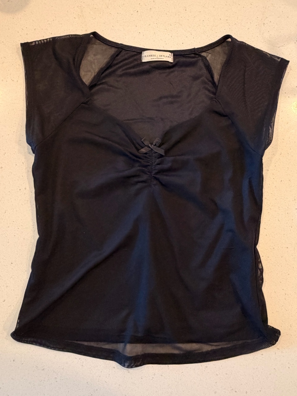 Black Sleeveless Top with Bow Detail